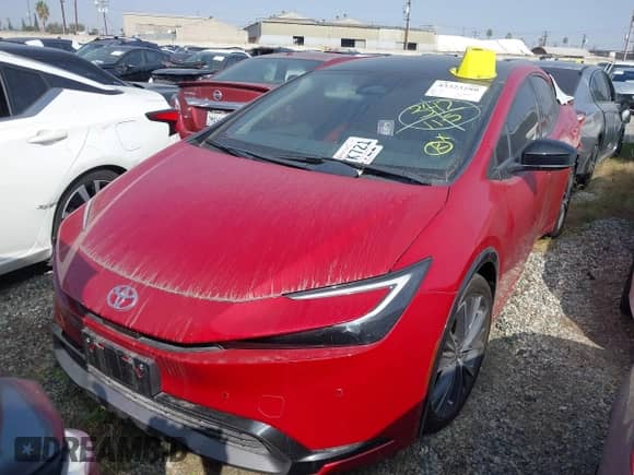 2024 Toyota Prius LE with VIN JTDACAAU0R3037645, listed as a IAAI auction lot 43323280 with 19,611 mi miles and . Bid and sale history available at DreamBid. Image 2.