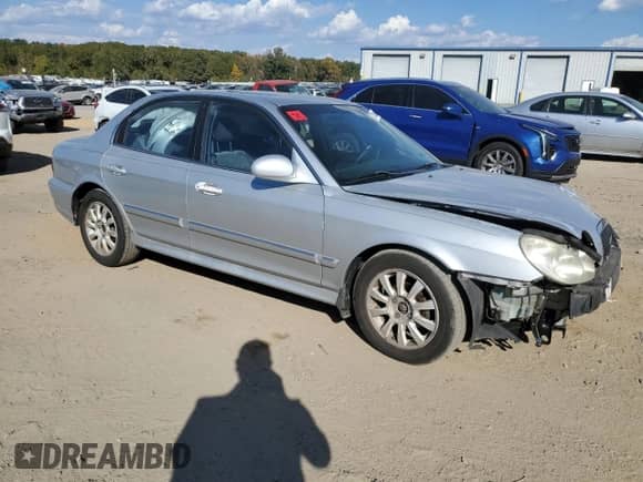 2004 Hyundai Sonata GLS with VIN KMHWF35H24A941387, listed as a Copart auction lot 77350514 with 280,521 mi miles and Salvage title. Bid and sale history available at DreamBid. Image 4.