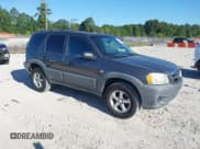 ✅ 2005 Mazda Tribute i • VIN: 4F2YZ02Z65KM48274 • Lot: 43129870. Listed on IAAI with 144,826 mi. Free auction sales archive from the USA and detailed vehicle history report at DreamBid. Image 1.