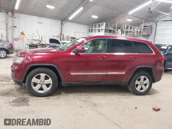 ✅ 2012 Jeep Grand Cherokee Laredo • VIN: 1C4RJFAG4CC273948 • Лот: 43709251. Опубликован ранее на IAAI с пробегом 254 170 миль. Бесплатный доступ к архиву аукционных продаж из США и подробный отчёт об истории автомобиля на DreamBid. Изображение 14.
