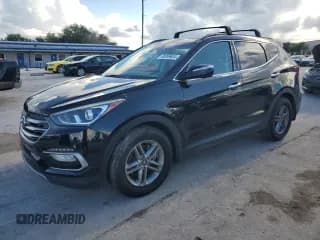 ✅ 2018 Hyundai Santa Fe 2.4L • VIN: 5NMZU3LB7JH078352 • Лот: 69099604. Опубликован ранее на Copart с пробегом 76 030 миль. Бесплатный доступ к архиву аукционных продаж из США и подробный отчёт об истории автомобиля на DreamBid. Изображение 1.