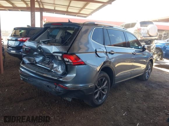 ✅ 2023 Volkswagen Tiguan SE • VIN: 3VVNB7AX1PM117728 • Lot: 42673251. Listed on IAAI with 27,915 mi. Free auction sales archive from the USA and detailed vehicle history report at DreamBid. Image 4.