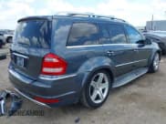 ✅ 2010 Mercedes-Benz GL 550 • VIN: 4JGBF8GE8AA573694 • Lot: 42193677. Listed on IAAI with 128,761 mi. Free auction sales archive from the USA and detailed vehicle history report at DreamBid. Image 4.