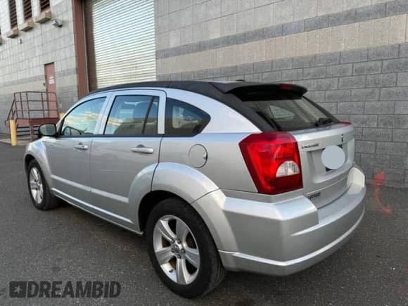 2010 Dodge Caliber SXT с VIN 1B3CB4HA1AD579409, выставлен на аукционе Copart как лот 49857695 с пробегом 100 311 миль миль и Чистый • Clean title. История ставок и продаж доступна на DreamBid. Изображение 3.
