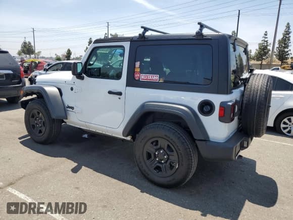 ✅ 2025 Jeep Wrangler Sport • VIN: 1C4PJXAN2SW576316 • Lot: 60550635. Listed on Copart with 1,730 mi. Free auction sales archive from the USA and detailed vehicle history report at DreamBid. Image 2.