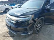 ✅ 2019 Honda Pilot Touring 7-Passenger • VIN: 5FNYF5H6XKB042963 • Lot: 42804976. Wystawiony na IAAI z przebiegiem 147 000 mil. Bezpłatny archiwum sprzedaży aukcyjnych z USA i szczegółowy raport historii pojazdu na DreamBid. Zdjęcie 6.