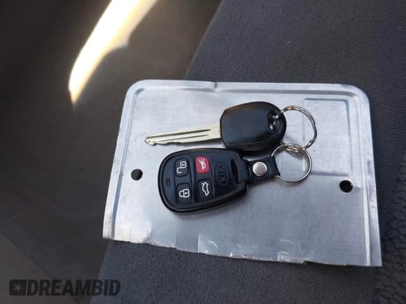 ✅ 2005 Kia Spectra LX • VIN: KNAFE121855155765 • Lot: 42509011. Listed on IAAI with 99,818 mi. Free auction sales archive from the USA and detailed vehicle history report at DreamBid. Image 11.