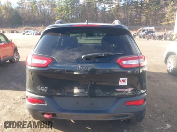 ✅ 2016 Jeep Cherokee Trailhawk • VIN: 1C4PJMBS4GW331544 • Lot: 43701389. Listed on IAAI with 96,030 mi. Free auction sales archive from the USA and detailed vehicle history report at DreamBid. Image 16.