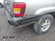 ✅ 1999 Jeep Grand Cherokee Laredo • VIN: 1J4G258SXXC518647 • Лот: 42124724. Опубликован ранее на IAAI с пробегом 229 668 миль. Бесплатный доступ к архиву аукционных продаж из США и подробный отчёт об истории автомобиля на DreamBid. Изображение 6.