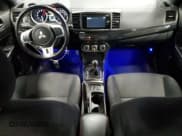 ✅ 2015 Mitsubishi Lancer Evolution Final Edition • VIN: JA32W7FV6FU028162 • Lot: 44627255. Wystawiony na Copart z przebiegiem 129 831 mil. Bezpłatny archiwum sprzedaży aukcyjnych z USA i szczegółowy raport historii pojazdu na DreamBid. Zdjęcie 8.