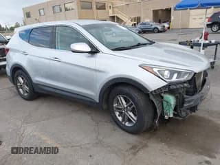 ✅ 2018 Hyundai Santa Fe 2.4L • VIN: 5XYZT3LB6JG571999 • Лот: 43406406. Опубликован ранее на IAAI с пробегом 104 647 миль. Бесплатный доступ к архиву аукционных продаж из США и подробный отчёт об истории автомобиля на DreamBid. Изображение 1.