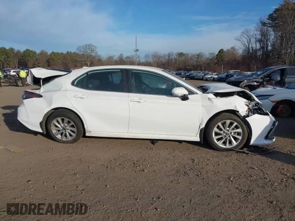 2021 Toyota Camry LE with VIN 4T1R11BK6MU034902, listed as a IAAI auction lot 41265861 with 32,060 mi miles and . Bid and sale history available at DreamBid. Image 13.