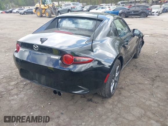 ✅ 2018 Mazda MX-5 Miata Grand Touring • VIN: JM1NDAM76J0205170 • Lot: 41963698. Wystawiony na IAAI z przebiegiem 108 136 mil. Bezpłatny archiwum sprzedaży aukcyjnych z USA i szczegółowy raport historii pojazdu na DreamBid. Zdjęcie 4.