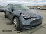 ✅ 2022 Tesla Model Y Long Range • VIN: 7SAYGDEE2NF443711 • Lot: 50913815. Wystawiony na Copart z przebiegiem 19 700 mil. Bezpłatny archiwum sprzedaży aukcyjnych z USA i szczegółowy raport historii pojazdu na DreamBid. Zdjęcie 14.