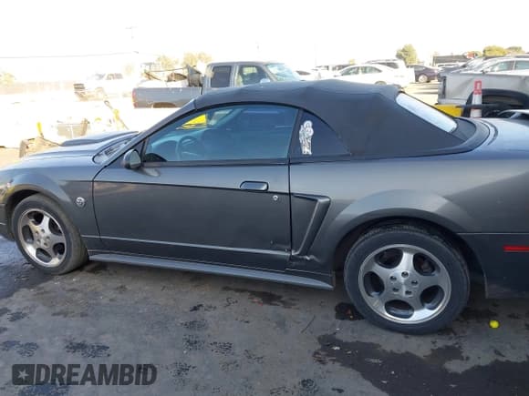 ✅ 2004 Ford Mustang Deluxe • VIN: 1FAFP44644F196058 • Lot: 43810293. Listed on IAAI with 136,950 mi. Free auction sales archive from the USA and detailed vehicle history report at DreamBid. Image 14.