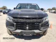 ✅ 2021 Chevrolet Colorado 4WD ZR2 • VIN: 1GCRTEEN5M1128122 • Лот: 80330175. Опубликован ранее на Copart с пробегом 76 144 миль. Бесплатный доступ к архиву аукционных продаж из США и подробный отчёт об истории автомобиля на DreamBid. Изображение 5.