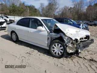 2004 Hyundai Sonata с VIN KMHWF25S34A977210, выставлен на аукционе Copart как лот 50971215 с пробегом 187 268 миль миль и Списание • Salvage title. История ставок и продаж доступна на DreamBid. Изображение 4.