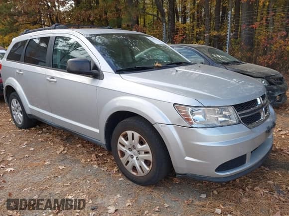 ✅ 2014 Dodge Journey American Value • VIN: 3C4PDCAB8ET154986 • Lot: 43731813. Listed on IAAI with 221,885 mi. Free auction sales archive from the USA and detailed vehicle history report at DreamBid. Image 1.