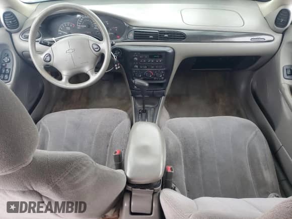 2003 Chevrolet Malibu z VIN 1G1ND52J53M700938, wystawiony jako Copart lot #87737165 z przebiegiem 175 705 mil mil oraz Czysty tytuł • Clean title. Historia ofert i sprzedaży dostępna na DreamBid. Obrazek 8.