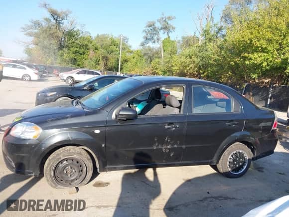 2007 Chevrolet Aveo LS z VIN KL1TD56667B098628, wystawiony jako IAAI lot #43324818 z przebiegiem 180 747 mil mil oraz . Historia ofert i sprzedaży dostępna na DreamBid. Obrazek 14.