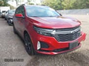 ✅ 2022 Chevrolet Equinox RS • VIN: 2GNAXMEV8N6140881 • Лот: 43249279. Опубликован ранее на IAAI с пробегом 69 492 миль. Бесплатный доступ к архиву аукционных продаж из США и подробный отчёт об истории автомобиля на DreamBid. Изображение 1.