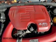 ✅ 2013 Dodge Challenger SXT • VIN: 2C3CDYAGXDH595537 • Lot: 84115864. Wystawiony na Copart z przebiegiem 109 005 mil. Bezpłatny archiwum sprzedaży aukcyjnych z USA i szczegółowy raport historii pojazdu na DreamBid. Zdjęcie 15.