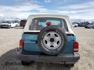 ✅ 1996 Chevrolet Tracker • VIN: 2CNBJ1869T6903615 • Лот: 49690055. Опубликован ранее на Copart с пробегом 144 821 миль. Бесплатный доступ к архиву аукционных продаж из США и подробный отчёт об истории автомобиля на DreamBid. Изображение 6.