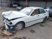 ✅ 1998 BMW 3 Series 318i • VIN: WBACC0324WEK27301 • Лот: 43749666. Опубликован ранее на IAAI с пробегом 224 555 миль. Бесплатный доступ к архиву аукционных продаж из США и подробный отчёт об истории автомобиля на DreamBid. Изображение 2.