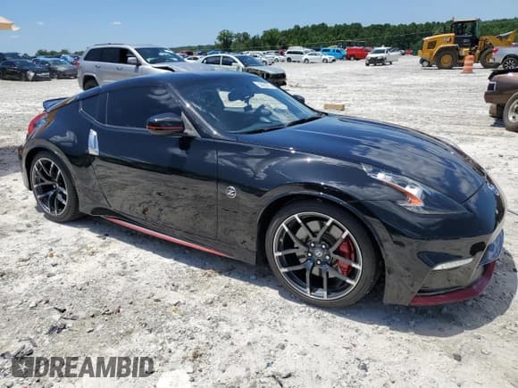 ✅ 2016 Nissan 370Z Nismo • VIN: JN1AZ4EH2GM935087 • Лот: 58222714. Опубликован ранее на Copart с пробегом 41 088 миль. Бесплатный доступ к архиву аукционных продаж из США и подробный отчёт об истории автомобиля на DreamBid. Изображение 4.