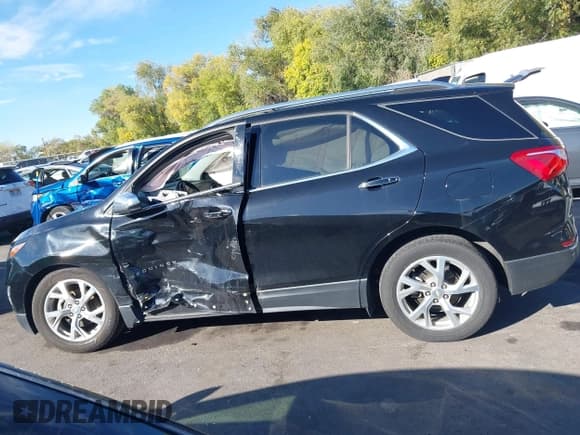 ✅ 2020 Chevrolet Equinox Premier • VIN: 2GNAXXEV6L6261293 • Лот: 43480562. Опубликован ранее на IAAI с пробегом 65 274 миль. Бесплатный доступ к архиву аукционных продаж из США и подробный отчёт об истории автомобиля на DreamBid. Изображение 14.