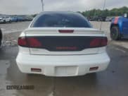 ✅ 1998 Pontiac Sunfire SE • VIN: 1G2JB524XW7512784 • Lot: 60646924. Listed on Copart with Not provided. Free auction sales archive from the USA and detailed vehicle history report at DreamBid. Image 6.