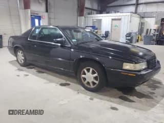 ✅ 2000 Cadillac Eldorado Touring ETC • VIN: 1G6ET1294YU144883 • Лот: 80979854. Опубликован ранее на Copart с пробегом 89 271 миль. Бесплатный доступ к архиву аукционных продаж из США и подробный отчёт об истории автомобиля на DreamBid. Изображение 4.