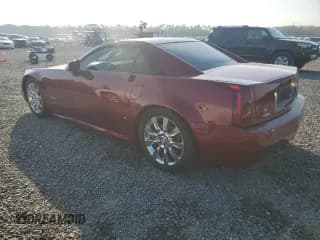 ✅ 2006 Cadillac XLR • VIN: 1G6YV36A465601366 • Лот: 76229944. Опубликован ранее на Copart с пробегом 33 159 миль. Бесплатный доступ к архиву аукционных продаж из США и подробный отчёт об истории автомобиля на DreamBid. Изображение 2.
