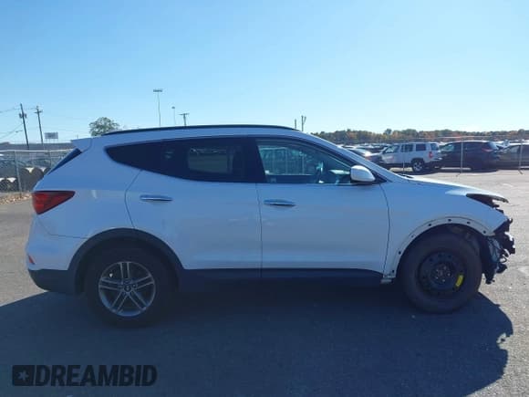 ✅ 2017 Hyundai Santa Fe 2.4L • VIN: 5NMZUDLB9HH031274 • Lot: 43485747. Listed on IAAI with 83,509 mi. Free auction sales archive from the USA and detailed vehicle history report at DreamBid. Image 17.