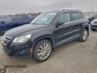 ✅ 2011 Volkswagen Tiguan S • VIN: WVGBV7AX0BW541981 • Lot: 93272715. Listed on Copart with 146,368 mi. Free auction sales archive from the USA and detailed vehicle history report at DreamBid. Image 1.