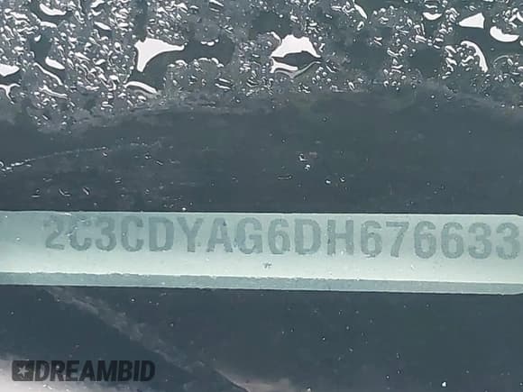 ✅ 2013 Dodge Challenger Rallye Redline • VIN: 2C3CDYAG6DH676633 • Lot: 40779561. Wystawiony na IAAI z przebiegiem 167 051 mil. Bezpłatny archiwum sprzedaży aukcyjnych z USA i szczegółowy raport historii pojazdu na DreamBid. Zdjęcie 9.