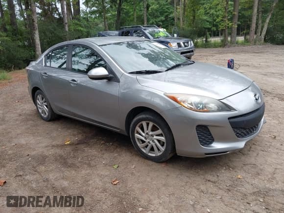 ✅ 2012 Mazda 3 i Touring • VIN: JM1BL1V84C1693996 • Lot: 43225641. Listed on IAAI with 125,243 mi. Free auction sales archive from the USA and detailed vehicle history report at DreamBid. Image 1.