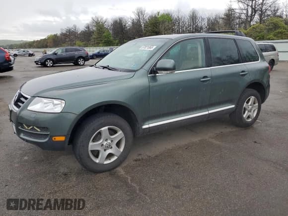 ✅ 2004 Volkswagen Touareg • VIN: WVGBC67L14D024353 • Lot: 57021865. Listed on Copart with 114,463 mi. Free auction sales archive from the USA and detailed vehicle history report at DreamBid. Image 1.