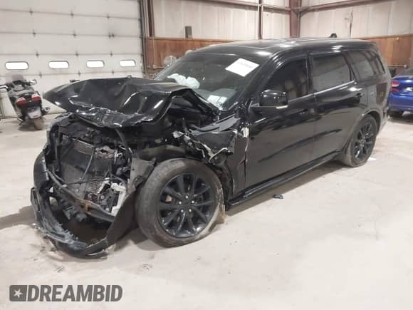 2017 Dodge Durango R/T with VIN 1C4SDJCT9HC945581, listed as a IAAI auction lot 43420044 with 143,365 mi miles and . Bid and sale history available at DreamBid. Image 2.