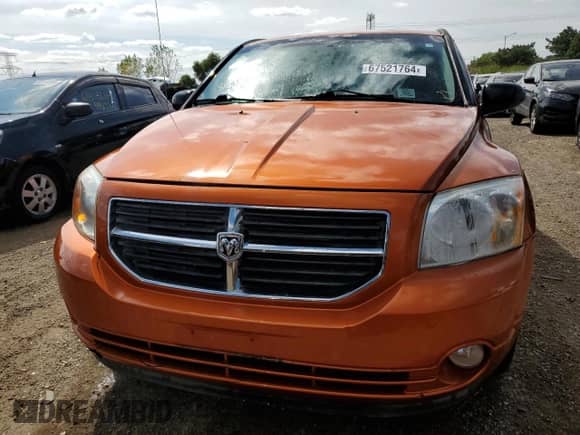 2011 Dodge Caliber Mainstreet z VIN 1B3CB3HAXBD108046, wystawiony jako Copart lot #67521764 z przebiegiem 152 280 mil mil oraz Szkoda całkowita • Salvage title. Historia ofert i sprzedaży dostępna na DreamBid. Obrazek 5.