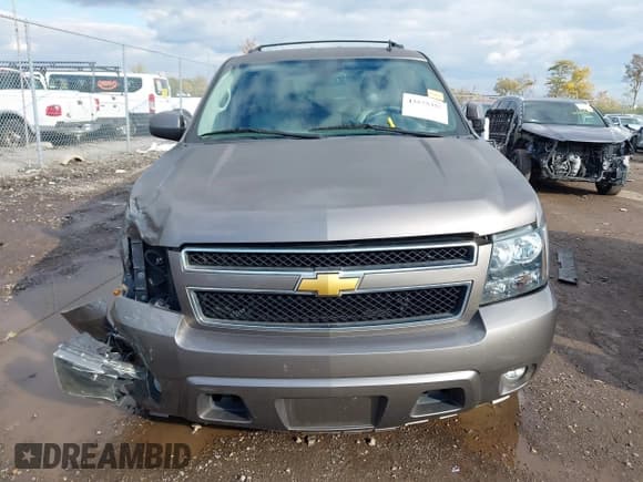 ✅ 2014 Chevrolet Tahoe LT • VIN: 1GNSCBE08ER117923 • Lot: 43575355. Listed on IAAI with 143,512 mi. Free auction sales archive from the USA and detailed vehicle history report at DreamBid. Image 12.