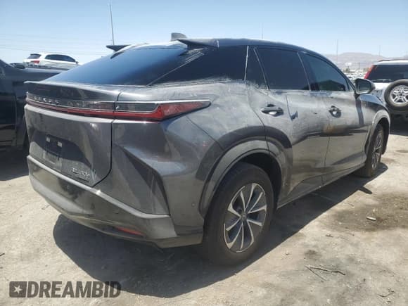 ✅ 2023 Lexus RZ 450e Premium • VIN: JTJAAAAB7PA010338 • Lot: 59992004. Listed on Copart with 10,040 mi. Free auction sales archive from the USA and detailed vehicle history report at DreamBid. Image 3.