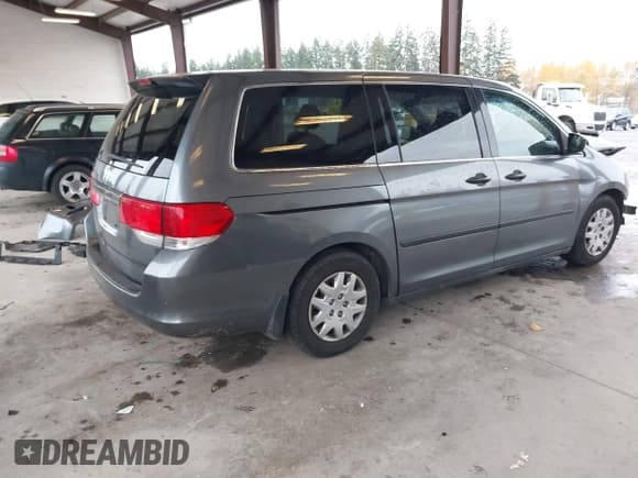 ✅ 2010 Honda Odyssey LX • VIN: 5FNRL3H24AB059836 • Lot: 43704388. Listed on IAAI with 140,336 mi. Free auction sales archive from the USA and detailed vehicle history report at DreamBid. Image 4.