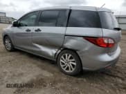 ✅ 2015 Mazda 5 Sport • VIN: JM1CW2BL2F0179147 • Lot: 54125515. Listed on Copart with 94,294 mi. Free auction sales archive from the USA and detailed vehicle history report at DreamBid. Image 2.