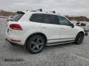 ✅ 2013 Volkswagen Touareg • VIN: WVGEG9BPXDD012733 • Lot: 91858355. Listed on Copart with 116,232 mi. Free auction sales archive from the USA and detailed vehicle history report at DreamBid. Image 3.