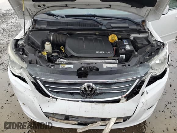 ✅ 2014 Volkswagen Routan SE • VIN: 2C4RVABG6ER134873 • Лот: 81464864. Опубликован ранее на Copart с пробегом 138 484 миль. Бесплатный доступ к архиву аукционных продаж из США и подробный отчёт об истории автомобиля на DreamBid. Изображение 13.