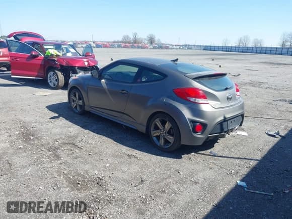✅ 2014 Hyundai Veloster Turbo • VIN: KMHTC6AE3EU196500 • Lot: 41765426. Wystawiony na IAAI z przebiegiem 132 913 mil. Bezpłatny archiwum sprzedaży aukcyjnych z USA i szczegółowy raport historii pojazdu na DreamBid. Zdjęcie 3.