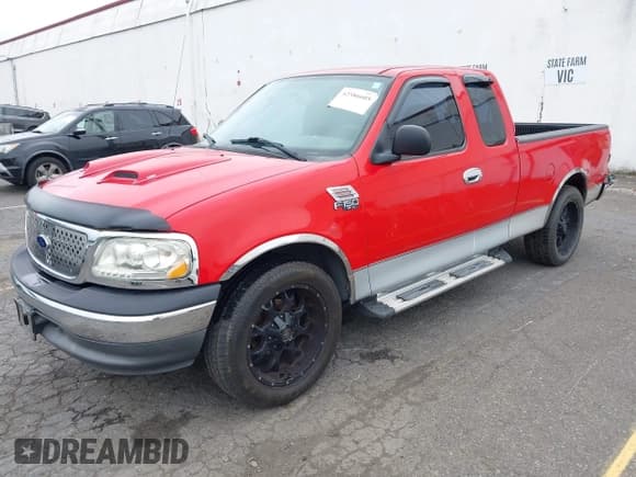 ✅ 2003 Ford F-150 XL • VIN: 1FTRX17213NB59701 • Lot: 42586605. Listed on IAAI with 93,836 mi. Free auction sales archive from the USA and detailed vehicle history report at DreamBid. Image 2.