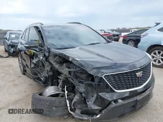 ✅ 2023 Cadillac XT4 FWD Sport • VIN: 1GYFZER4XPF188577 • Лот: 41892040. Опубликован ранее на IAAI с пробегом 34 155 миль. Бесплатный доступ к архиву аукционных продаж из США и подробный отчёт об истории автомобиля на DreamBid. Изображение 1.