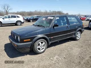✅ 1991 Volkswagen Golf GTI • VIN: 3VWDB21G7MM023746 • Lot: 66414904. Wystawiony na Copart z przebiegiem 105 926 mil. Bezpłatny archiwum sprzedaży aukcyjnych z USA i szczegółowy raport historii pojazdu na DreamBid. Zdjęcie 1.